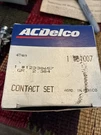 Nos Gm Ignition Uni-set #1876600 .. Points + Condenser Delco #D-1007. Fixed Price $20.00.