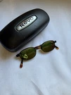 Vintage Revo 1112/001 Rectangle Sunglasses Italy Green Mirror Lenses Rare. Fixed Price $450.00.