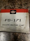 New Old Stock Genuine Standard Distributor Cap FD-171. Fixed Price $13.95.