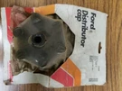 Standardized Ford 1922 Distributor Cap. Fixed Price $12.00.