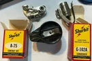 + Fixin It! Shurhit Ignition Repair Parts D-129 Rotor Points Condensor. Fixed Price $19.00.